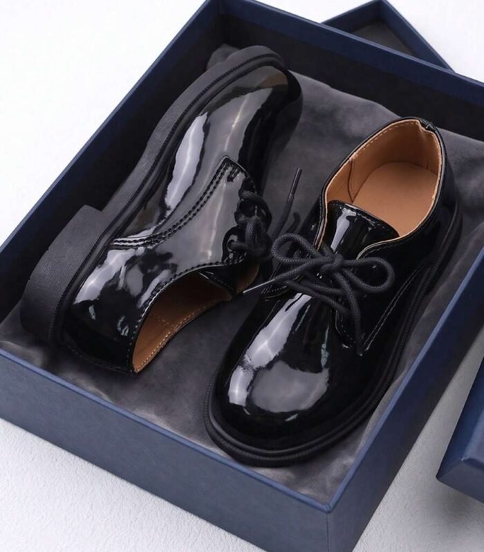 boys shiny black lace-up Oxford dress shoes